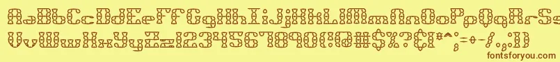 Bknuckst-Schriftart – Braune Schriften auf gelbem Hintergrund