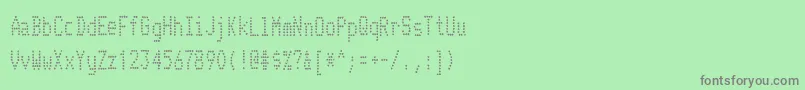 TelidoninkcdRegular Font – Gray Fonts on Green Background
