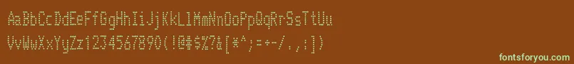 フォントTelidoninkcdRegular – 緑色の文字が茶色の背景にあります。