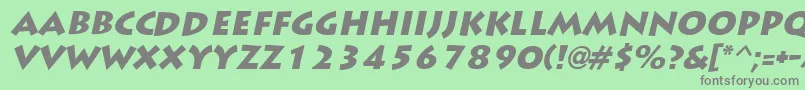 LiddieblackItalic-fontti – harmaat kirjasimet vihreällä taustalla