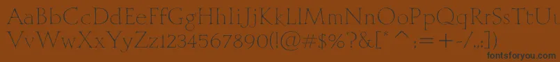 MithrasItcTt Font – Black Fonts on Brown Background