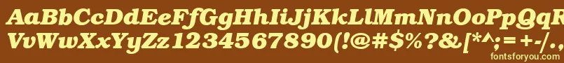 BookBoldItalic-fontti – keltaiset fontit ruskealla taustalla