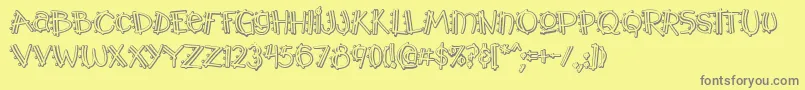 Y2kpopmuzoutaoe-fontti – harmaat kirjasimet keltaisella taustalla