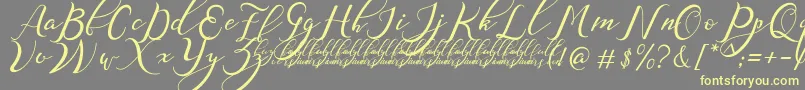 NazeefaDemo Font – Yellow Fonts on Gray Background