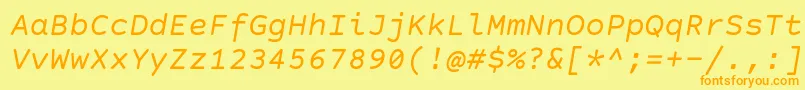 フォントCourierPrimeCodeItalic – オレンジの文字が黄色の背景にあります。