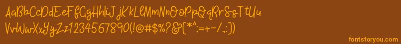 KhBlacklineScriptMedium Font – Orange Fonts on Brown Background