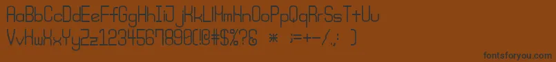 フォントMondaySrb – 黒い文字が茶色の背景にあります