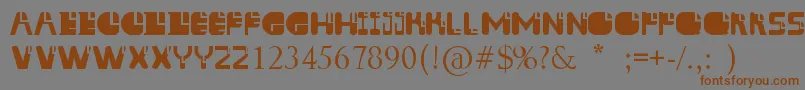 フォントAissur – 茶色の文字が灰色の背景にあります。