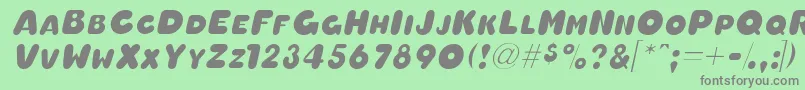 OleadascapssskItalic Font – Gray Fonts on Green Background