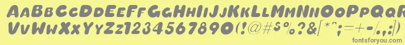 OleadascapssskItalic Font – Gray Fonts on Yellow Background