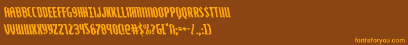 Zollernleft-Schriftart – Orangefarbene Schriften auf braunem Hintergrund