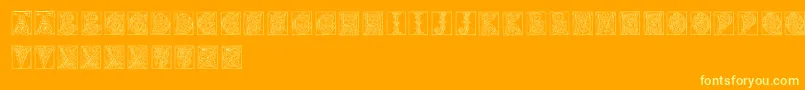 Miniaturecaps Font – Yellow Fonts on Orange Background