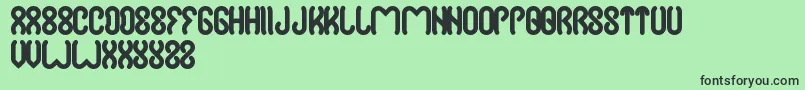 Czcionka Jussta – czarne czcionki na zielonym tle