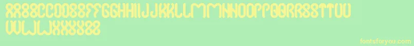 Jussta Font – Yellow Fonts on Green Background