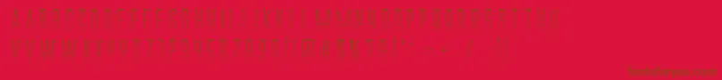 Alienleaguegradbold-Schriftart – Braune Schriften auf rotem Hintergrund