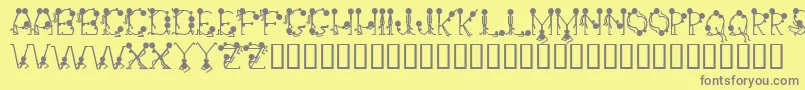 Groupsex Font – Gray Fonts on Yellow Background