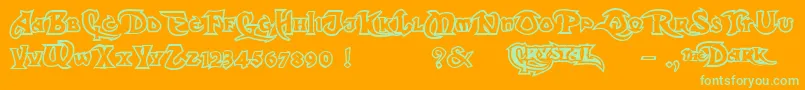 DarkCrystalOutline-Schriftart – Grüne Schriften auf orangefarbenem Hintergrund