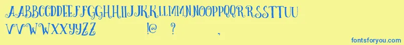 CurelyFreeTypeface-Schriftart – Blaue Schriften auf gelbem Hintergrund
