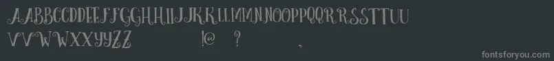 Шрифт CurelyFreeTypeface – серые шрифты на чёрном фоне