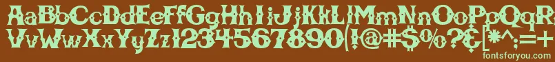 フォントCbgbfont – 緑色の文字が茶色の背景にあります。