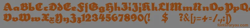 フォントNeptun – 茶色の文字が灰色の背景にあります。