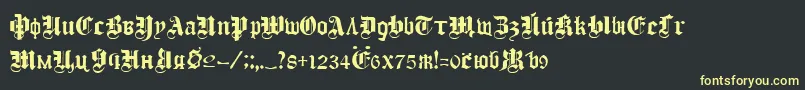 フォントColouraRegular – 黒い背景に黄色の文字