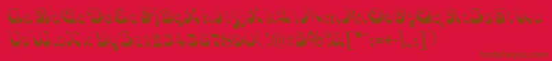 Fonte FunkyFaceRegular – fontes marrons em um fundo vermelho