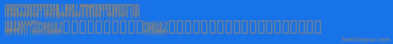 フォントSpikedRegular – 青い背景に灰色の文字