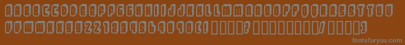 Letters-fontti – harmaat kirjasimet ruskealla taustalla