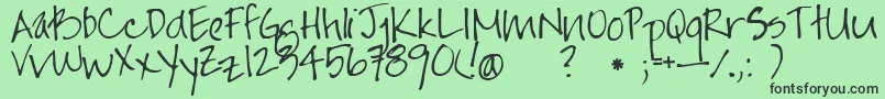Jayne Print Hand Font – Black Fonts on Green Background