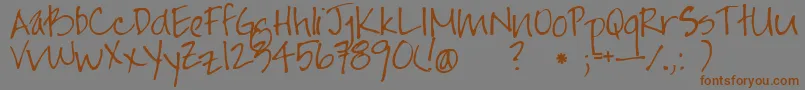 Jayne Print Hand Font – Brown Fonts on Gray Background