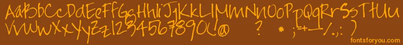 Jayne Print Hand Font – Orange Fonts on Brown Background