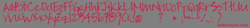 Jayne Print Hand Font – Red Fonts on Gray Background