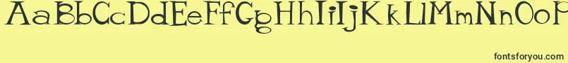 MisterTate Font – Black Fonts on Yellow Background