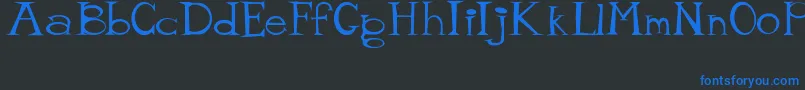 MisterTate Font – Blue Fonts on Black Background