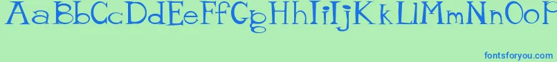 MisterTate Font – Blue Fonts on Green Background