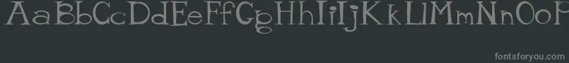 フォントMisterTate – 黒い背景に灰色の文字