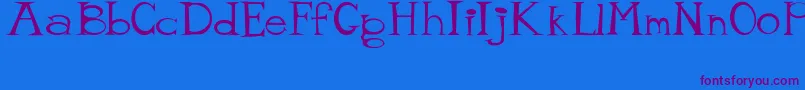 MisterTate Font – Purple Fonts on Blue Background