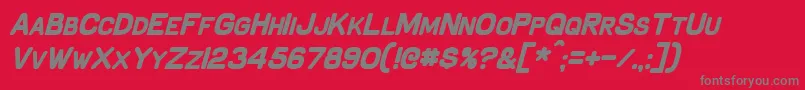 SchnaubeltBoldItalic-fontti – harmaat kirjasimet punaisella taustalla