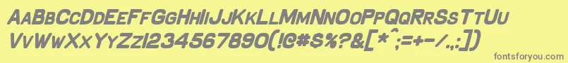 SchnaubeltBoldItalic-fontti – harmaat kirjasimet keltaisella taustalla