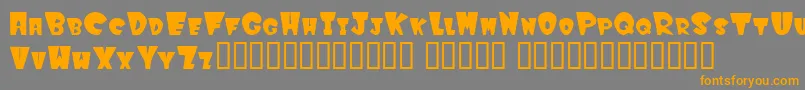 フォントWinkf – オレンジの文字は灰色の背景にあります。