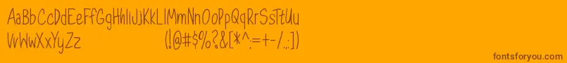 DorathyPersonalUseOnly-fontti – ruskeat fontit oranssilla taustalla
