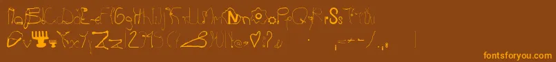 Kurzwaren Font – Orange Fonts on Brown Background