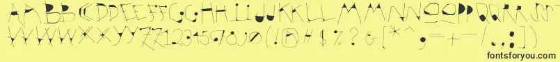 Krakelfabet Font – Black Fonts on Yellow Background