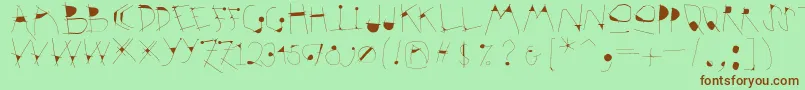 Krakelfabet Font – Brown Fonts on Green Background