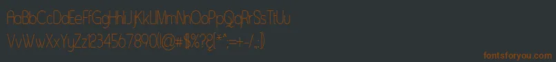 Fonte Asent – fontes marrons em um fundo preto