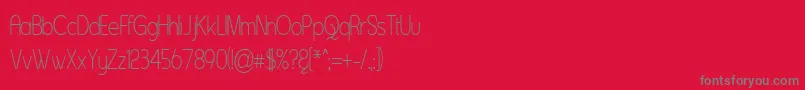 フォントAsent – 赤い背景に灰色の文字