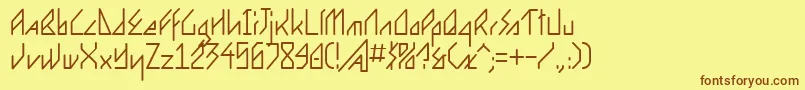 フォントErgonome – 茶色の文字が黄色の背景にあります。