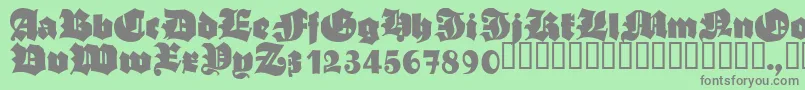 フォントAsgardianWars – 緑の背景に灰色の文字