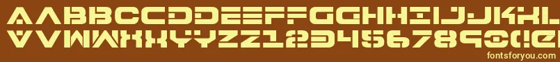 7thServiceExtrabold-fontti – keltaiset fontit ruskealla taustalla